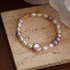 Lavender baroque pearl bracelet with natural freshwater pearls close-up detail showing unique organic pearl shapes and soft luster