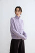 Lavender wool cashmere cardigan, front view on model