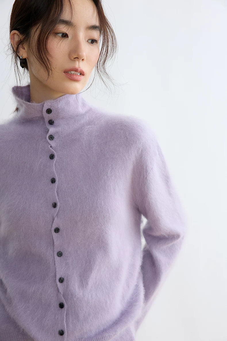 Lavender wool cardigan, close-up of half-high neckline and wave-curved button placket