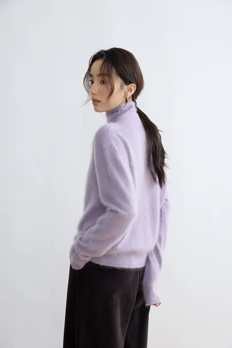 Lavender wool cardigan, side-back view on model