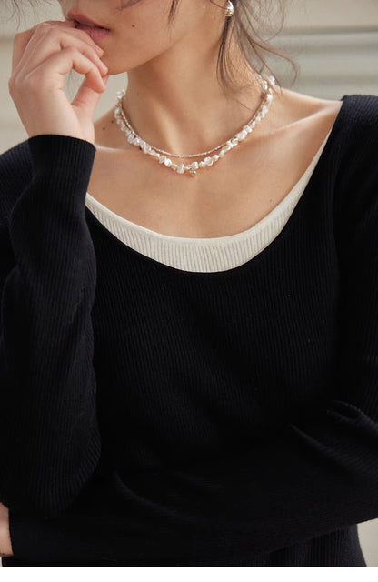 Layered Elegance Knit Sweater Top black close up neckline detail contrast inner layer ribbed knit
