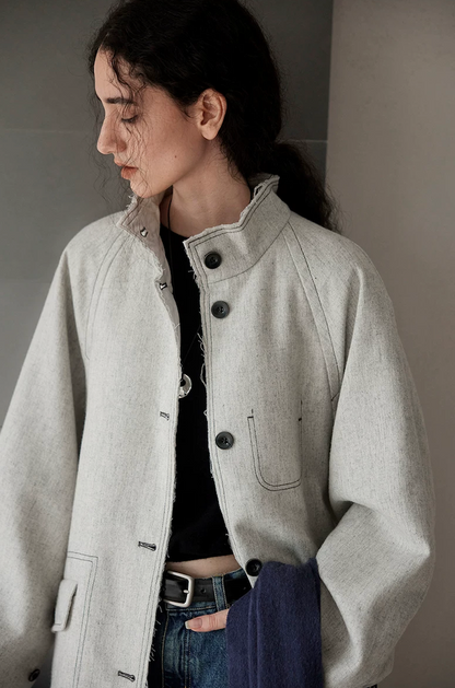 Close-up of a light gray coat&