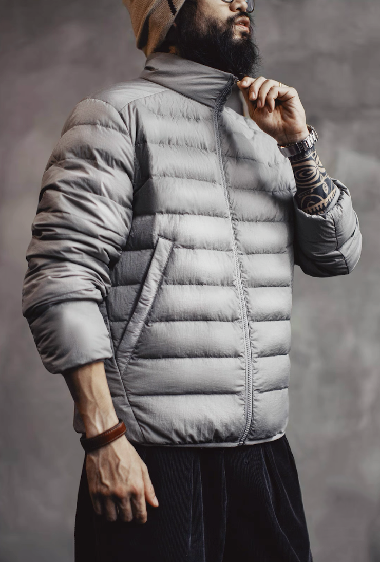 Men wearing Light Grey Ultra-Light Down Jacket with beanie and watch