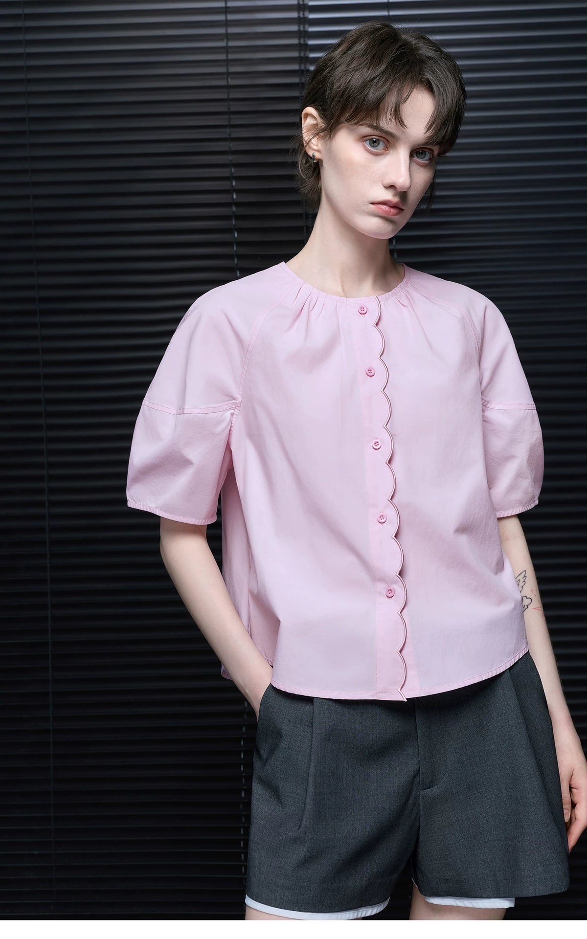 Waist-up front view of Light Pink raglan puff sleeve blouse with gathered round neck