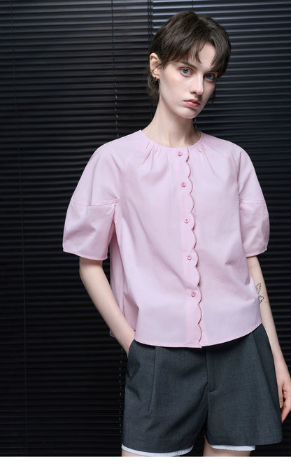 Waist-up front view of Light Pink raglan puff sleeve blouse with gathered round neck