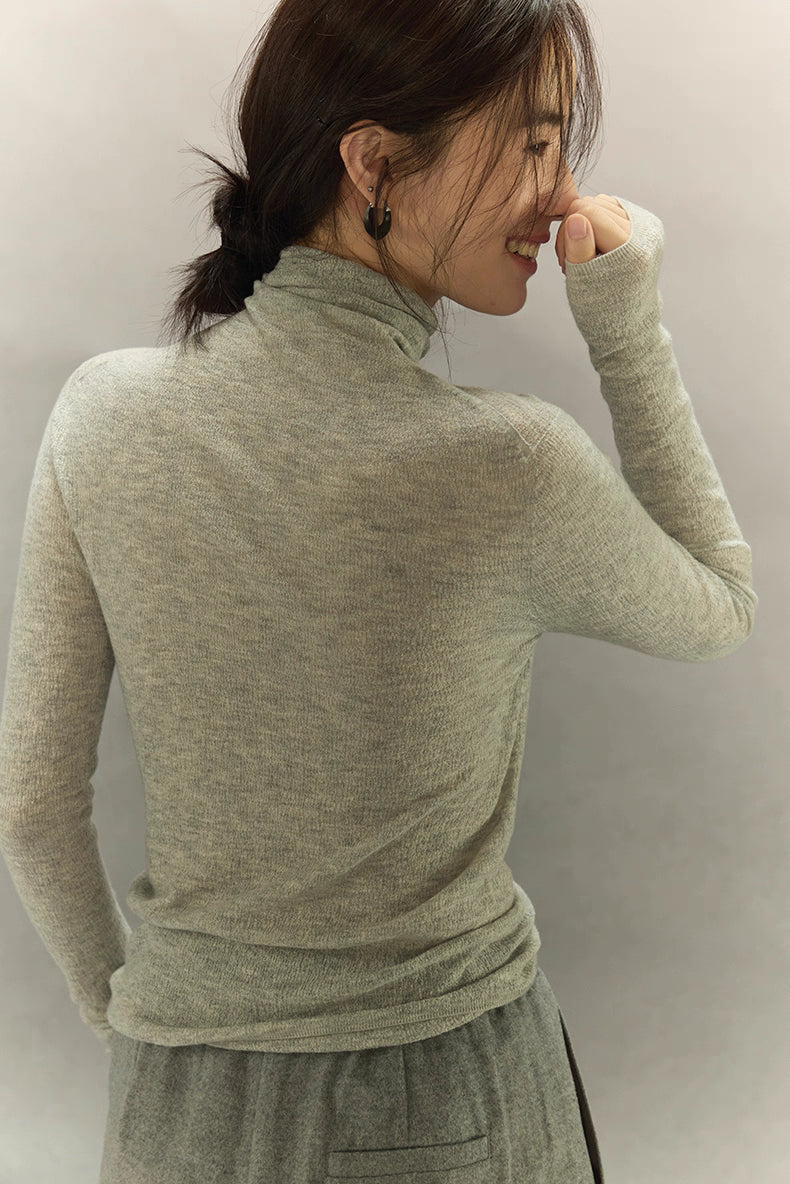 Back view of Light Gray seamless turtleneck showing smooth fit and drape.
