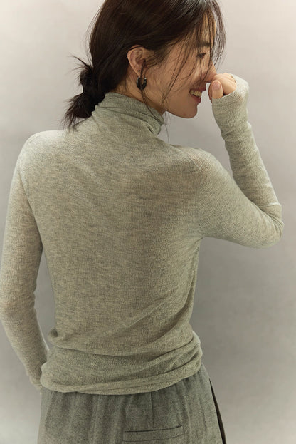 Back view of Light Gray seamless turtleneck showing smooth fit and drape.