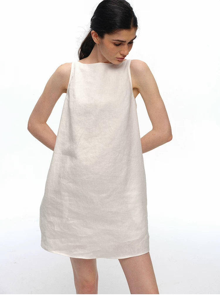 Close-up of ivory linen boatneck shift dress neckline and texture