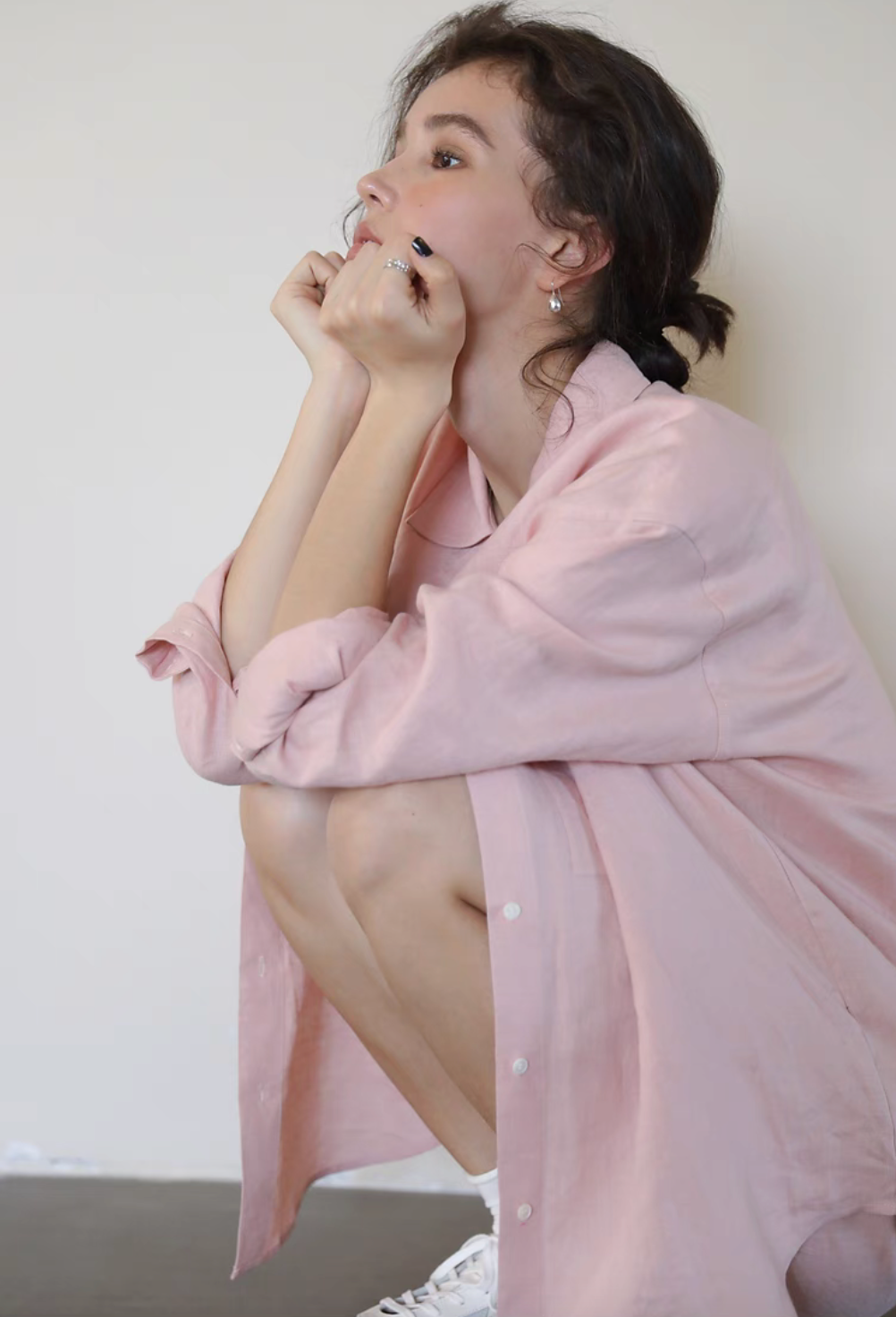 Pink linen collared shirt side profile view relaxed fit long sleeve design