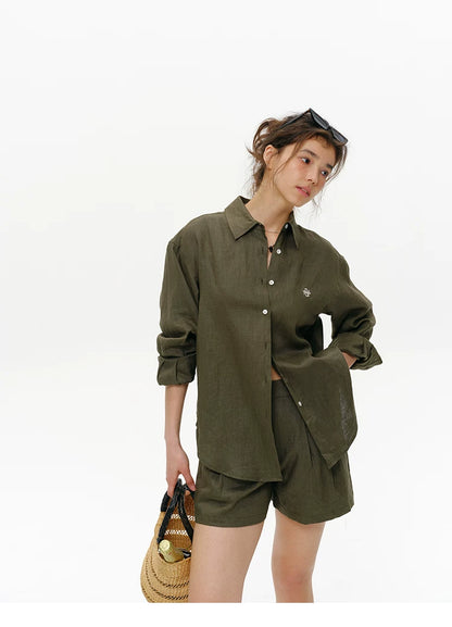 Front view of olive green embroidered linen shirt, oversized relaxed fit