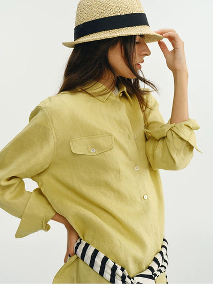 Close-up of yellow linen utility shirt chest pocket and collar detail