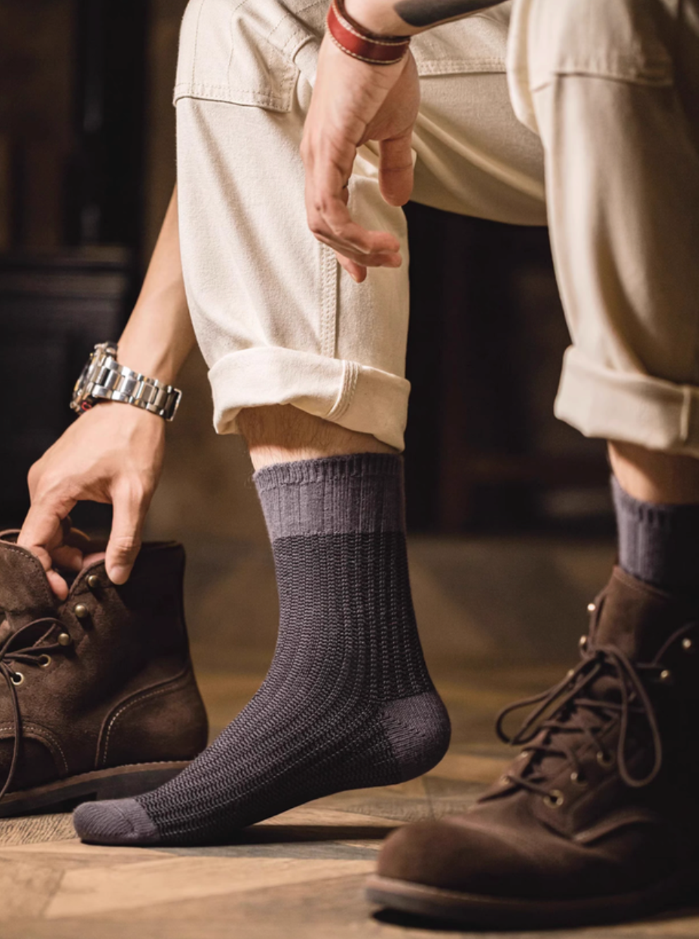 Lucky Chunky Knit Socks in black worn with brown leather boots and rolled pants for a rugged casual everyday look