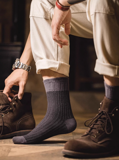 Lucky Chunky Knit Socks in black worn with brown leather boots and rolled pants for a rugged casual everyday look