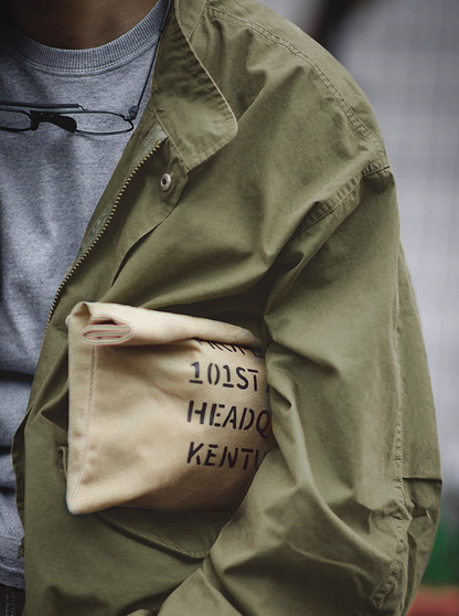 Close-up of M-65 fishtail parka chest and pocket detail