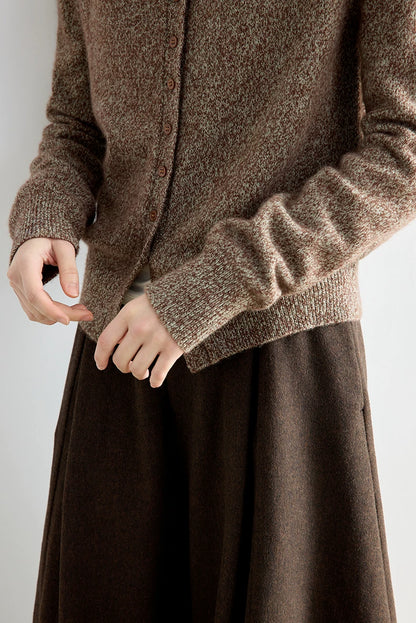 Close-up of heather brown wool cardigan cuff and hem detail