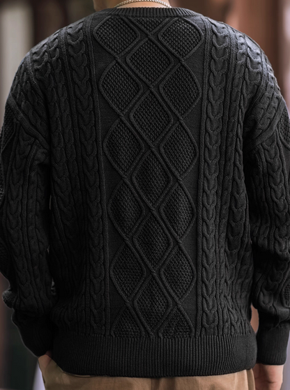 Men’s black diamond cable knit sweater, back view with full pattern.