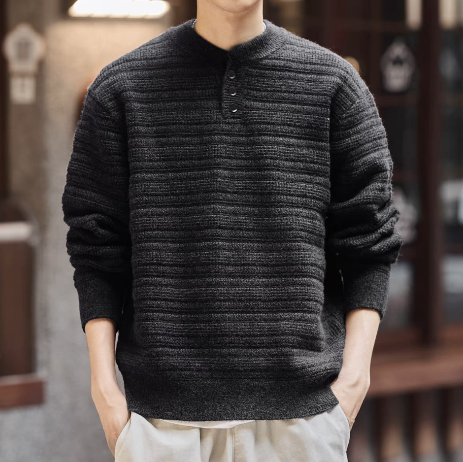 Men’s charcoal gray Henley knit sweater with ribbed cuffs and relaxed fit.