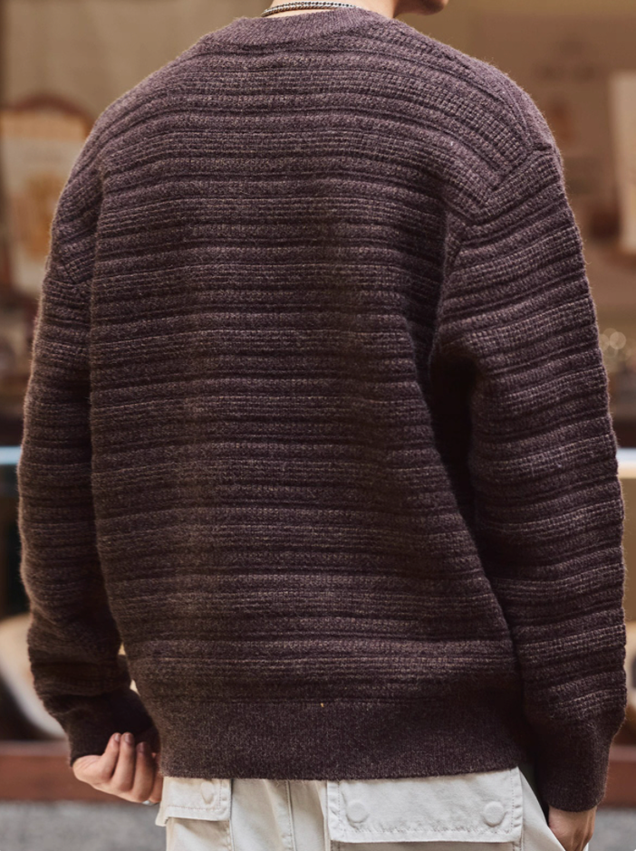 Back view of men’s deep purple Henley knit sweater, textured rib design.