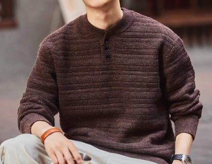 Lifestyle shot of deep purple Henley sweater – cozy knit with casual outfit.