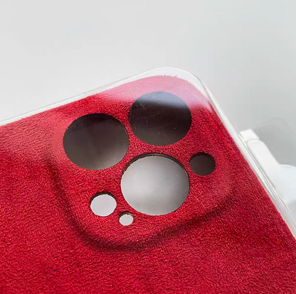 Burgundy microfiber suede phone case close-up of camera cutout with premium matte texture