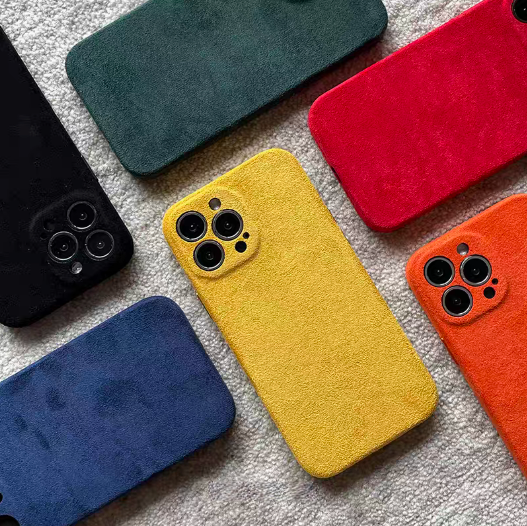 Microfiber suede solid color matte phone case collection in forest green, burgundy, yellow, orange, black, and royal blue