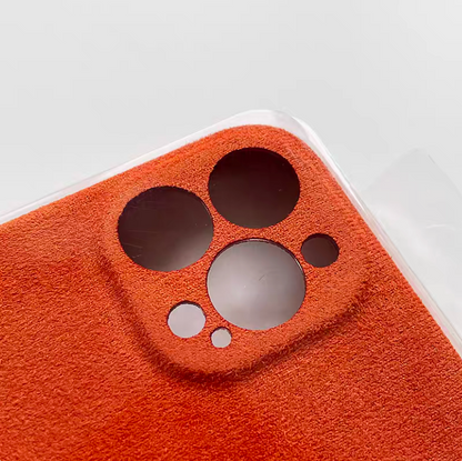 Orange microfiber suede phone case close-up of camera cutout and textured matte finish