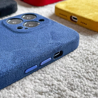 Royal blue microfiber suede phone case side view showing button controls and charging port access