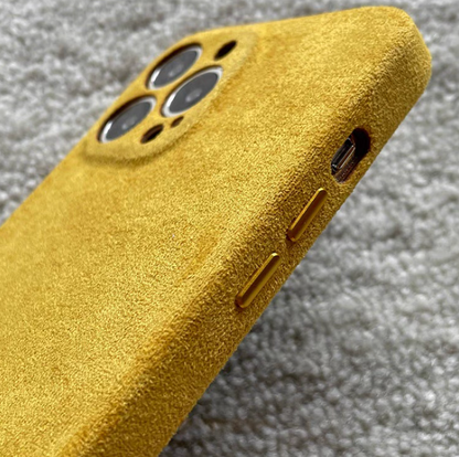 Yellow microfiber suede phone case side view showing button design and charging port access