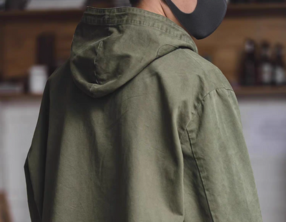 Back view of Army Green military deck jacket hoodie, showing hood shape and shoulder structure from rear angle