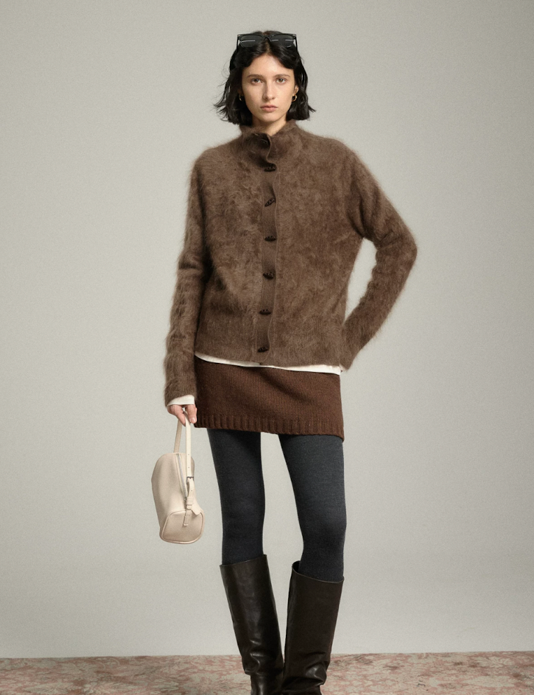 Full-length view of a Mocha hip-length cashmere cardigan with long sleeves and ribbed hem