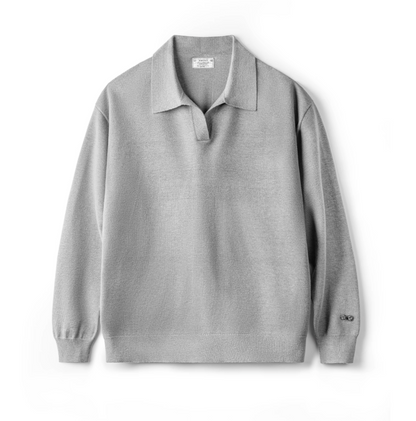 Flat lay of gray modern knit polo sweater with ribbed cuffs and collar.