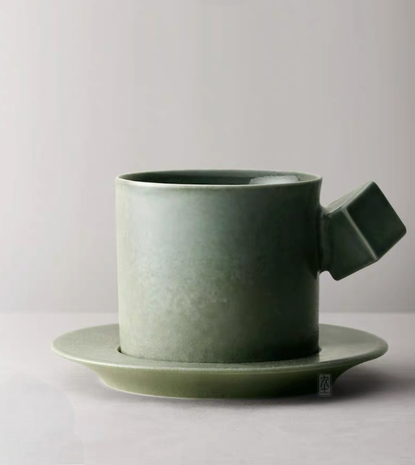 Green Modern Minimalist Ceramic Cup and Saucer Set single product view showing smooth glaze and geometric handle design