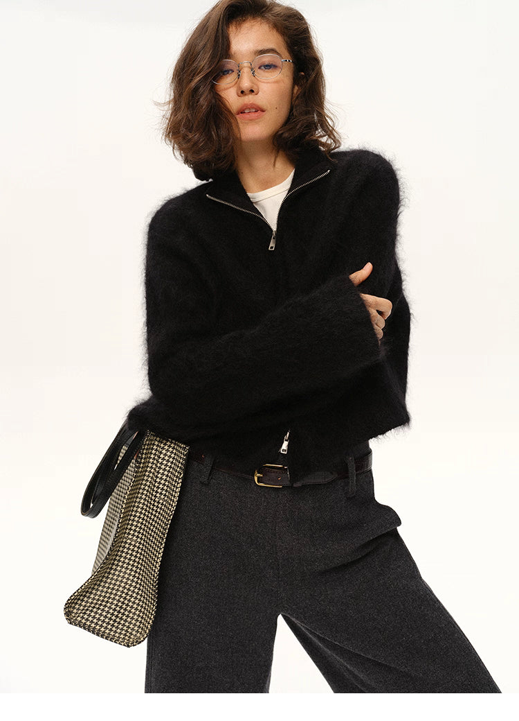 Black fuzzy mohair cardigan styled with grey trousers for winter look