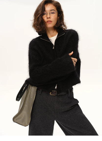 Black fuzzy mohair cardigan styled with grey trousers for winter look