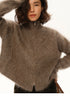 Woman wearing smoky brown fuzzy mohair zip cardigan in high-neck style