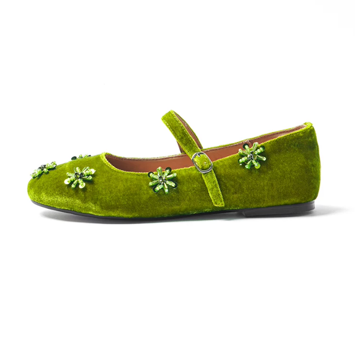 Side profile of a Moss Green velvet Mary Jane with buckled strap and low flat heel