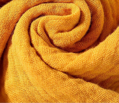 Yellow cotton gauze texture detail of baby comfort cloth toy