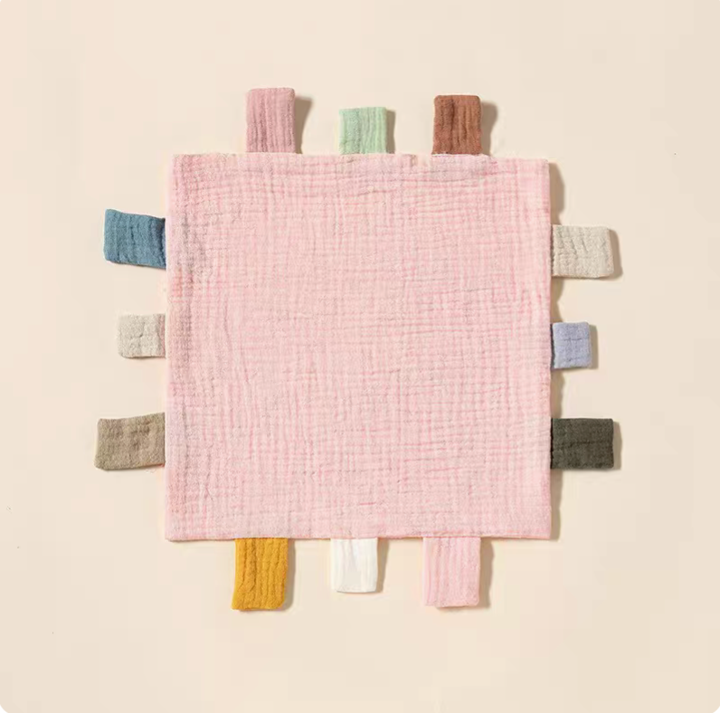 Light pink sensory baby comfort teething cloth toy front view