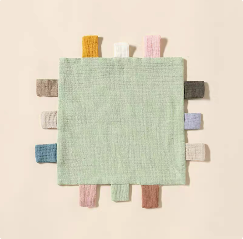 Light green sensory baby comfort teething cloth toy front view