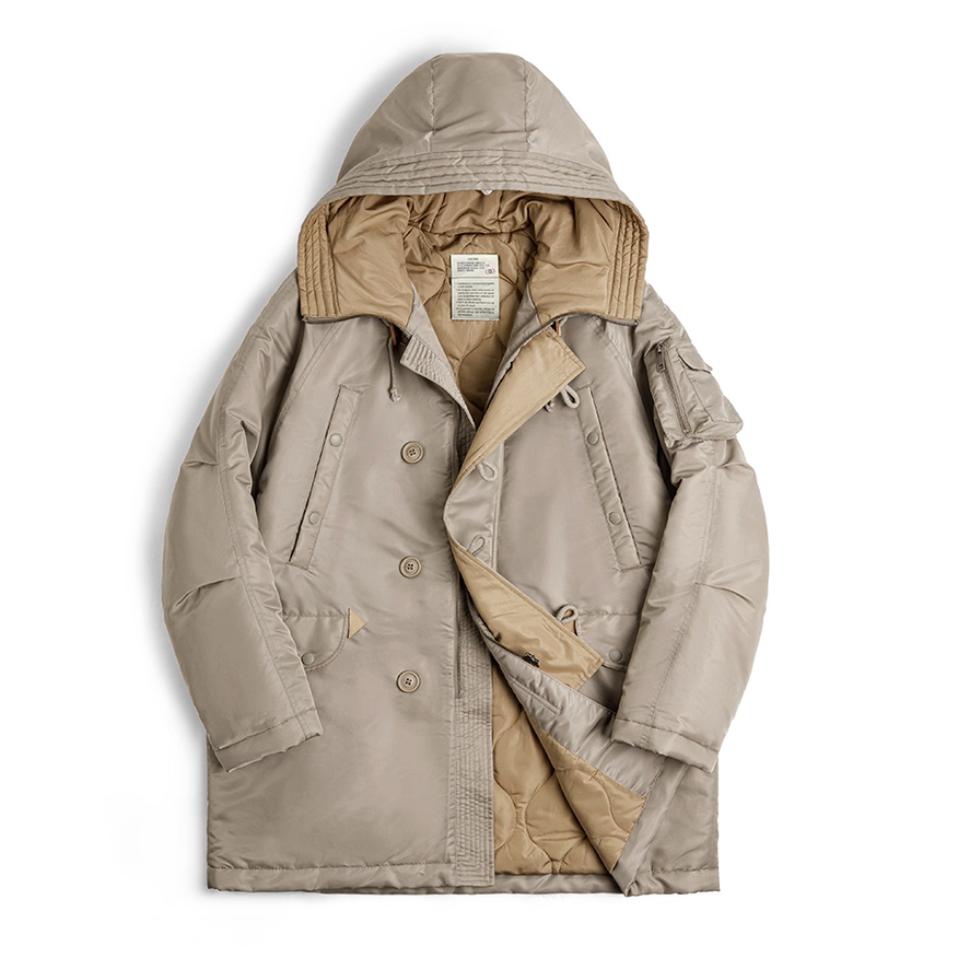 Flatlay of khaki N-3B snorkel parka showing double placket and quilted lining.