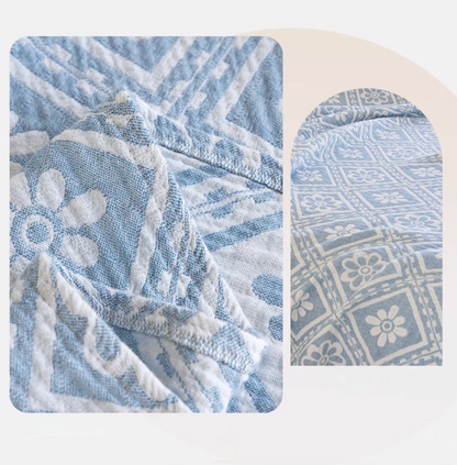 Detail collage of Nature Cotton Quilt Blue Chrysanthemum showing cotton gauze jacquard weave pattern