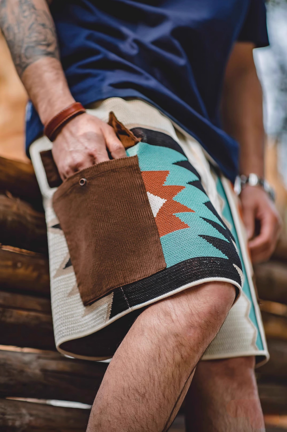 Navajo-Inspired Geometric Knit Beach Shorts diamond pattern close-up of front pocket and textured knit fabric detail