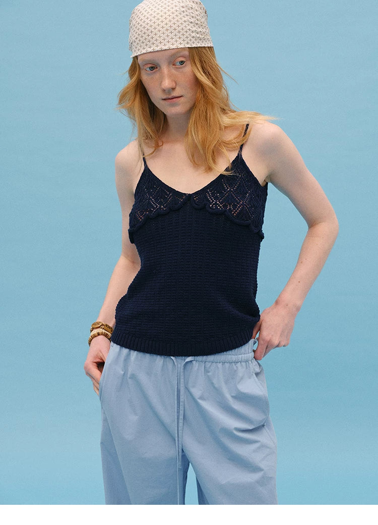 Front view of Navy pointelle knit cami showing lacy bodice and ribbed hem