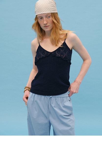 Front view of Navy pointelle knit cami showing lacy bodice and ribbed hem