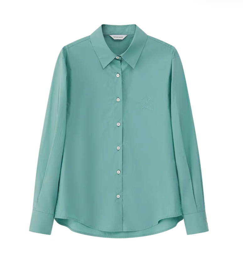 Green embroidered relaxed shirt shown in flat lay highlighting classic spread collar and clean button front