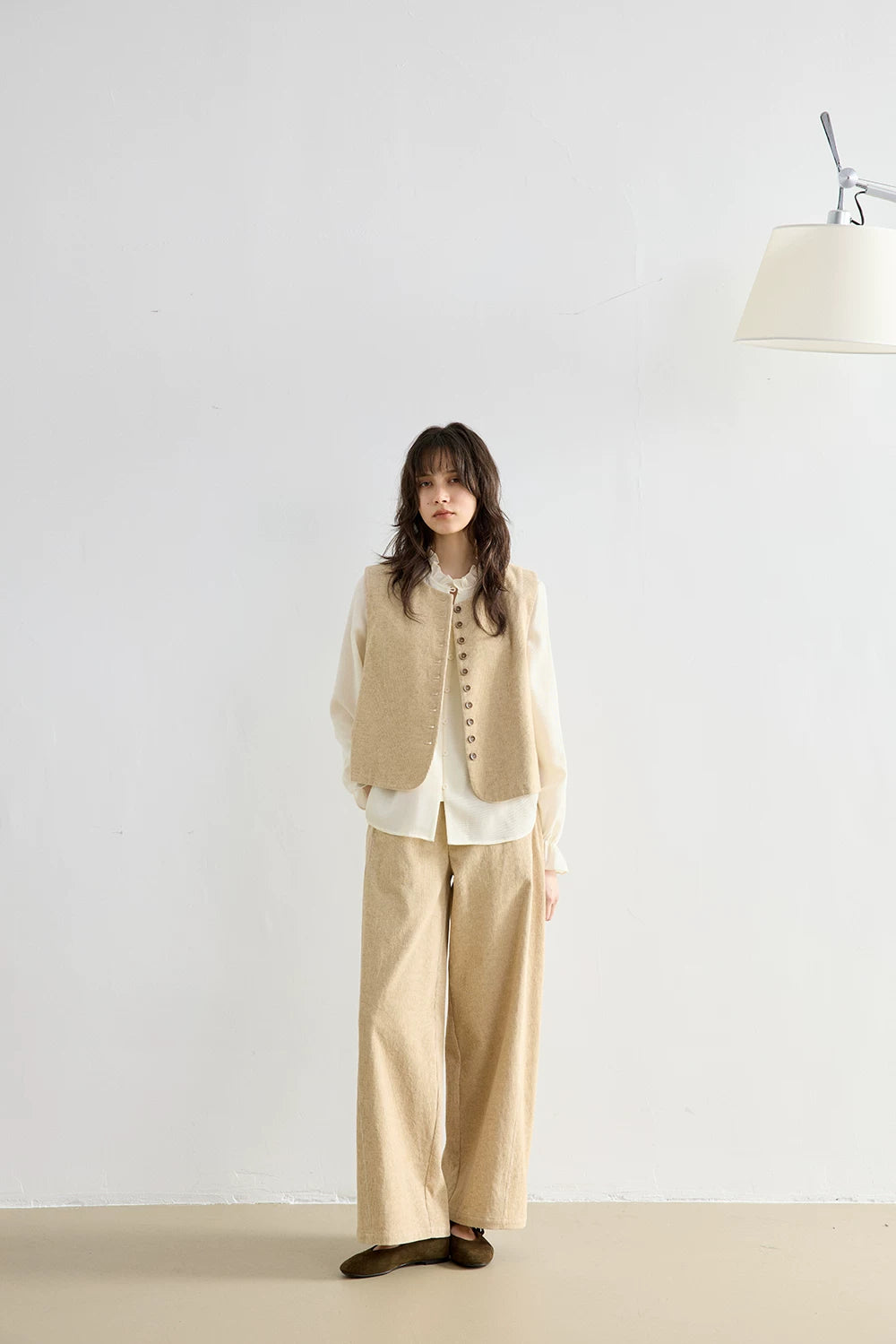 Full-length front view of Oatmeal corduroy vest and wide-leg pants two-piece set