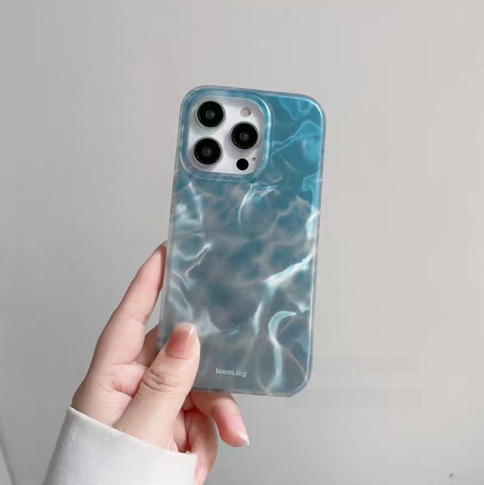 Ocean blue ripple pattern phone case close back view showing water wave texture and smooth finish