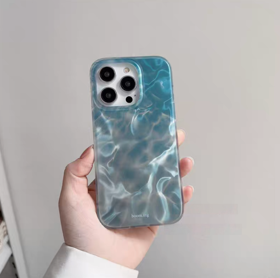 Ocean blue water ripple phone case back view with glossy wave pattern stylish protective design