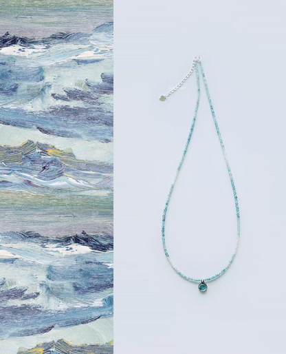 Ocean Breeze aquamarine necklace full view with light blue gradient gemstone beads and silver clasp