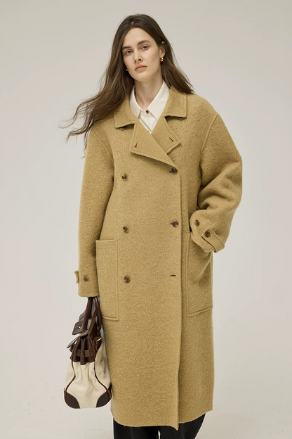 Ochre double-face wool coat showing notched lapels, tortoiseshell-look buttons, and cuff tab